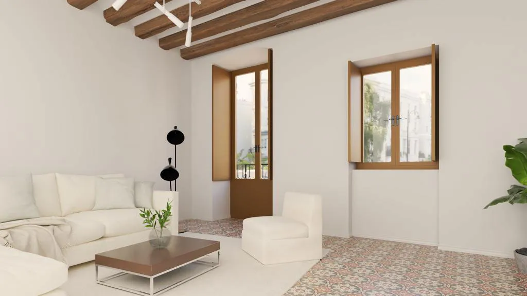 Refurbishment on Carrer Nou, Vilanova i la Geltrú — renovated interior with an open kitchen